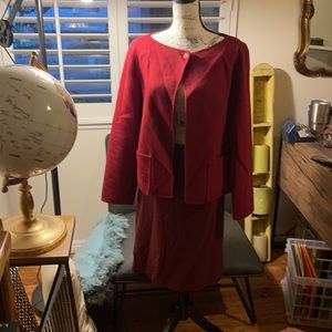 Ellen Tracy jacket and short mid thigh skirt.